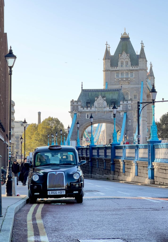 London Taxi against Tower Bridge